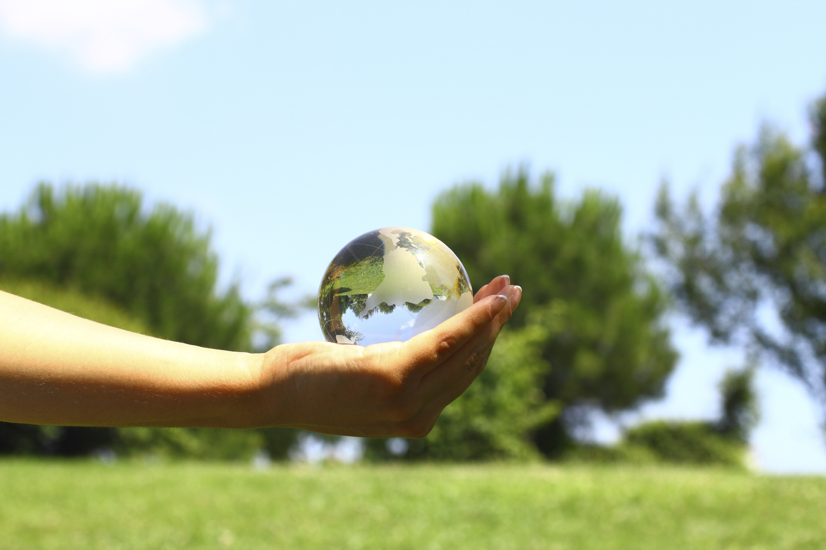 Glass Planet On Hand