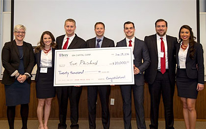 Team Rhizofeed holding large cheque winner MBA Ivey Business Plan Competition 2016