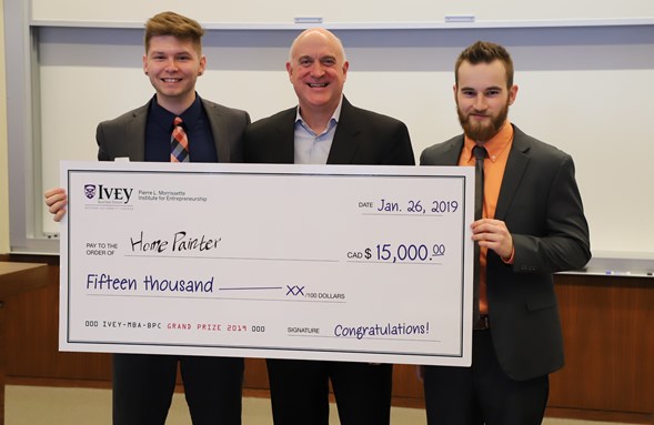Team HomePainters holding winning cheque for the 2019 MBA Ivey Business Plan Competition