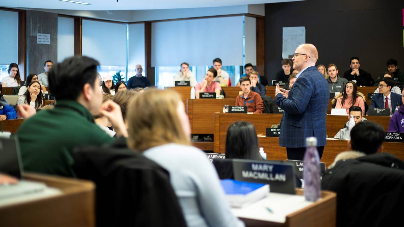 Larry Plummer Gives Verbal Lecturing in Ivey Classroom