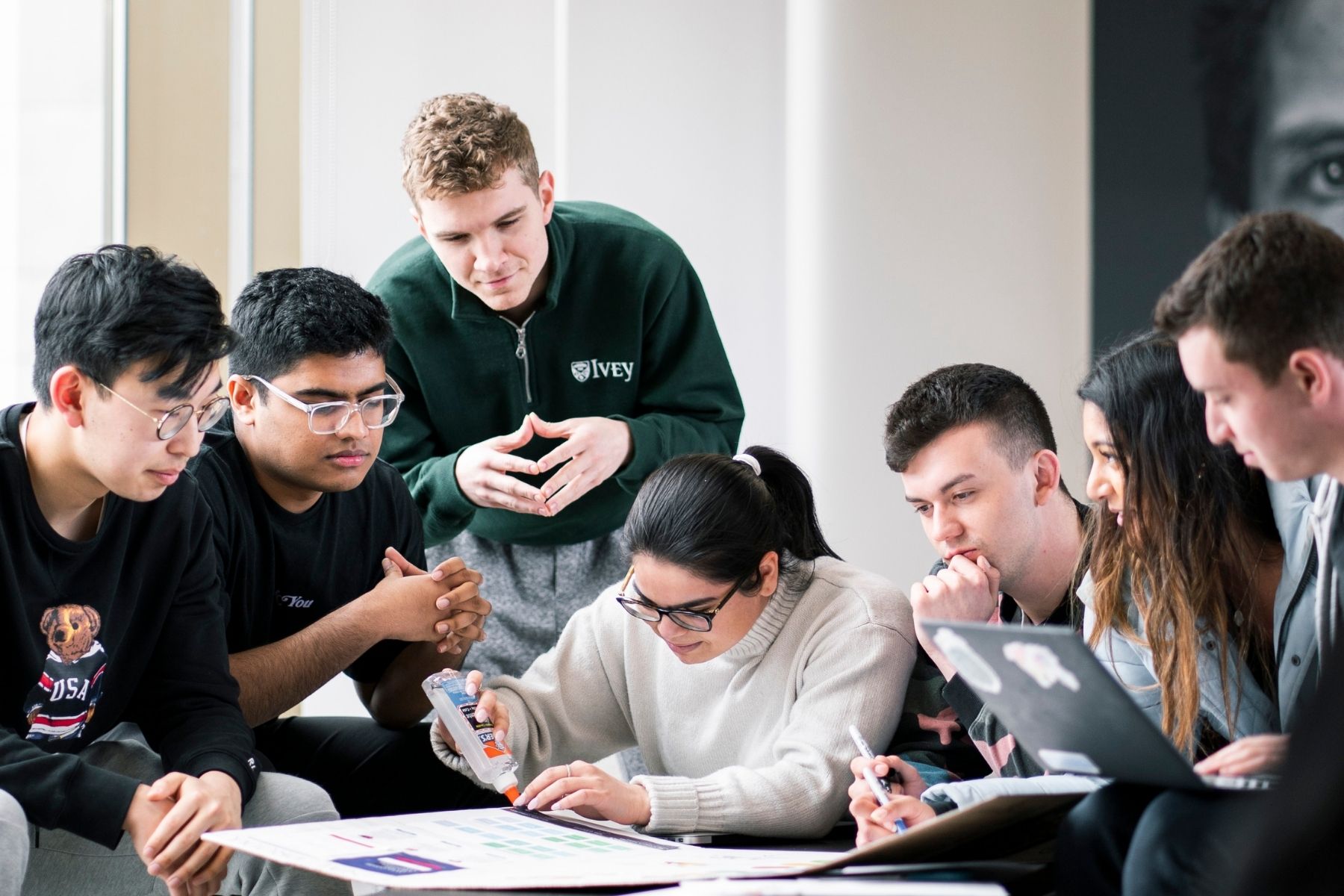 Group of Ivey students working on a group project