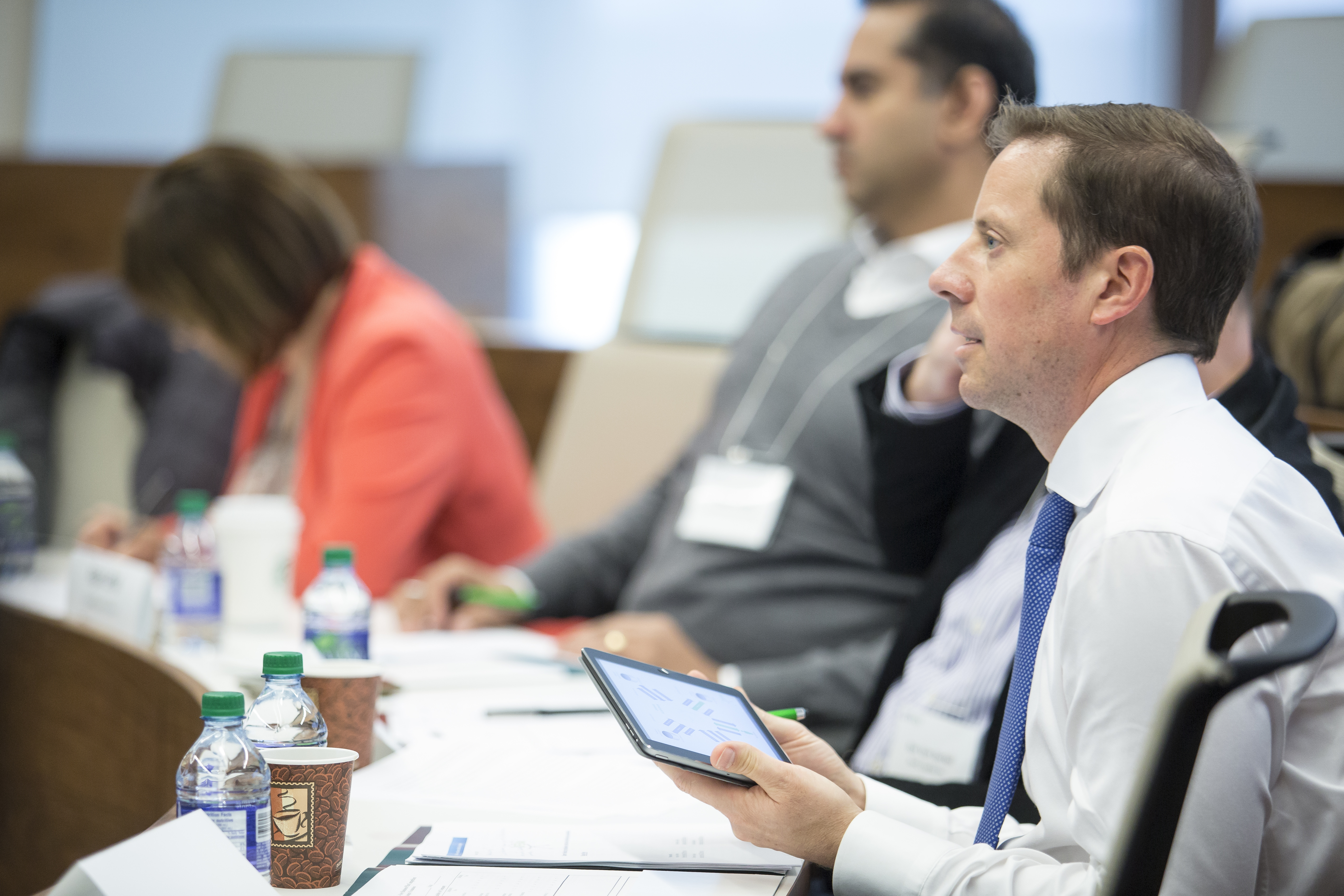 Michael White asking questions from students at the Ivey Business Plan Competition